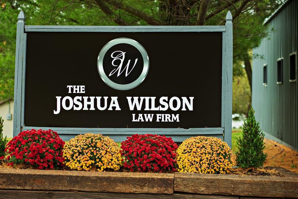 Higher Level Legal office sign with JW monogram