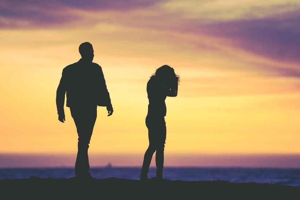 Couple Fighting On Rocks