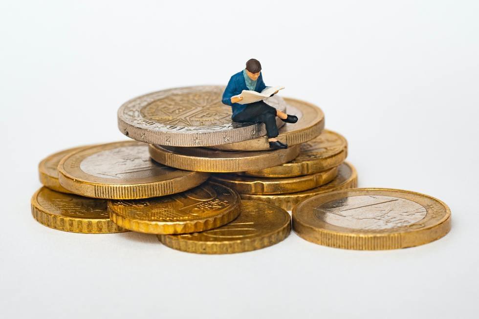 Stack of gold coins representing nonmarital property in a divorce