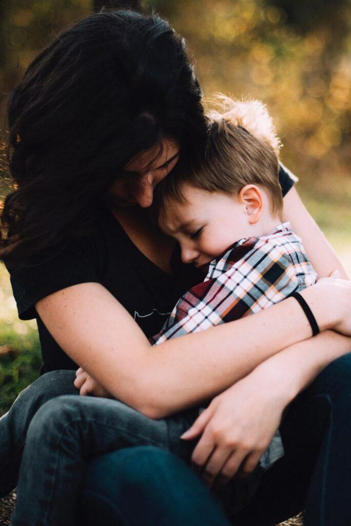 Mom Hugging Child Boy