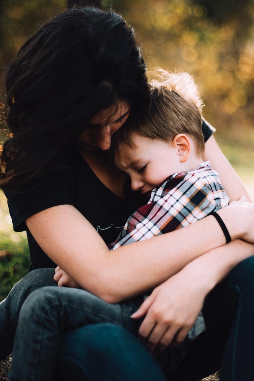 Mom Hugging Child Boy