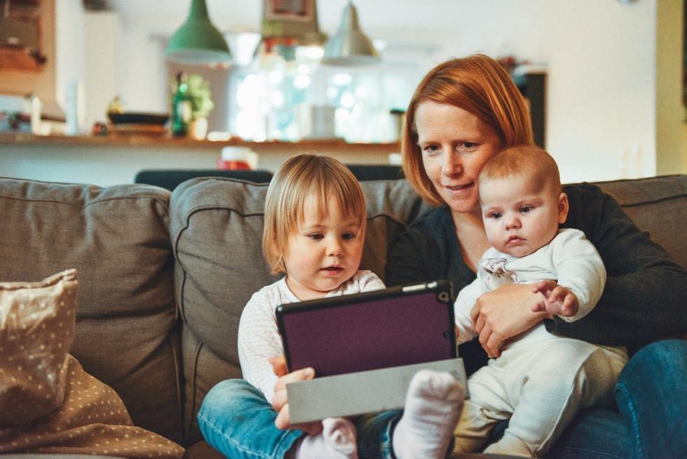 Mom With Kids On Tablet